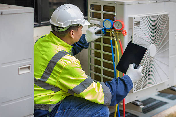 Professional Hvac technician working in Ashland, MA